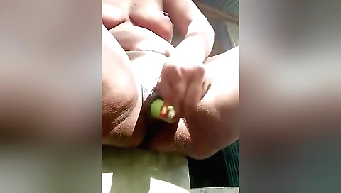 Indian girl in a sexy black dress fucks a dildo in her pussy