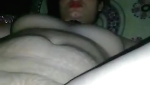 Indian milf with a round ass shows off her ass in a black lingerie