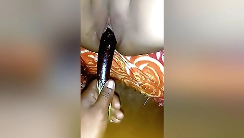 Amateur indian porn video with a girl sucking a toy