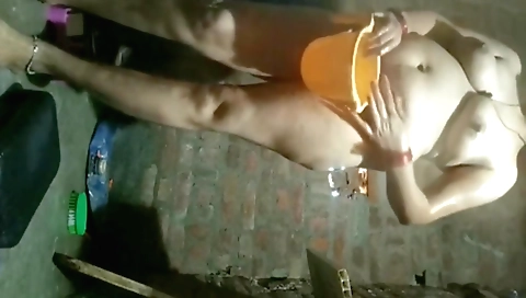 Babes in a bath room get naked and play with their boobs