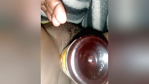 Amateur blonde in amateur solo video fills her hairy pussy