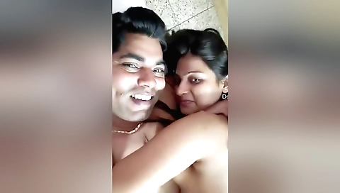 Indian babe is wearing a sexy outfit and kissing the guy