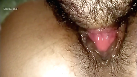 Indian girl and her stepbrother play with a black dildo