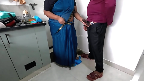 Big-assed tamil maid jerking the dick in her kitchen