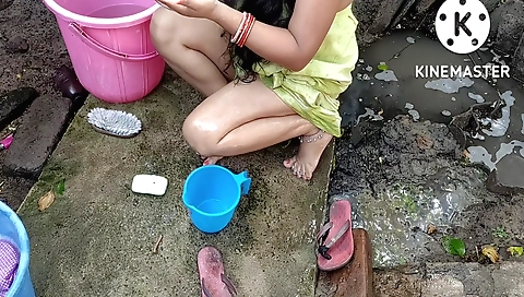 Indian woman in a long skirt strips naked in the bathroom