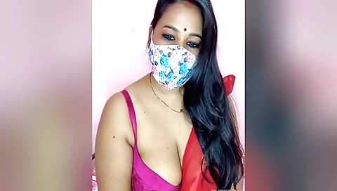 Horny indian brunette is playing with her natural boobs