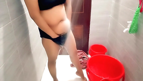 Indian brunette showered in a hot shower in a nice lingerie