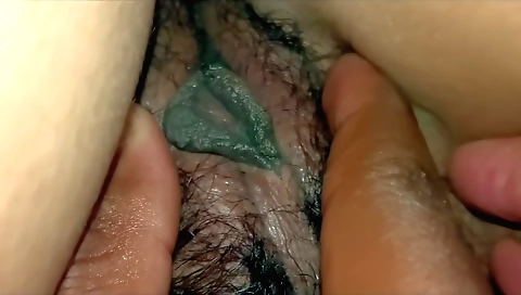 Indian brunette babe with hairy bush is massaging boots