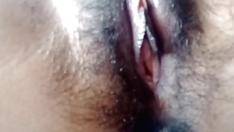 Indian hairy girl with natural boobs has fun on a table