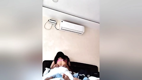 A brunette with a nice face and big natural tits suckles a guy