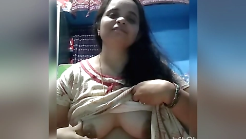 Indian babe in a sexy outfit shows off her big boobs