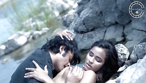 Brunette girl with a nice pair of tits is playing with a friend