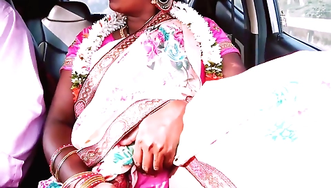 Sexy brunette indian girl in pink saree tries to take off her clothes