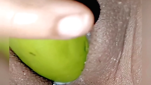 Indian brunette enjoys playing with big rubber toys