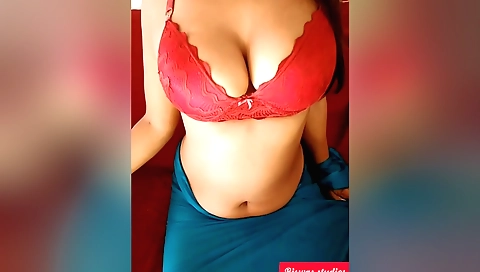 Bhabhi girl with big boobs and a red dress in the kitchen