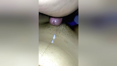 Indian hairy girl in a white blouse and a black skirt