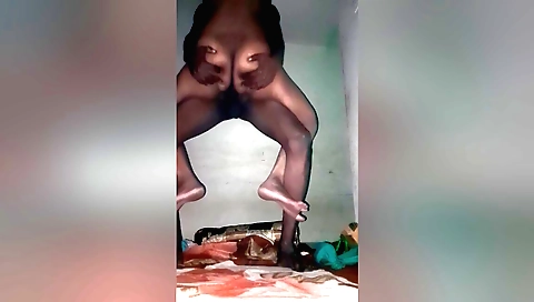 Indian brunette with huge boobs fucks herself in a position