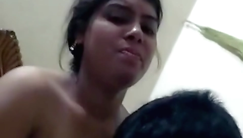Indian busty whore is on the bed with her boyfriend