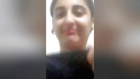 Curvy brunette gets naked on the bed to masturbate