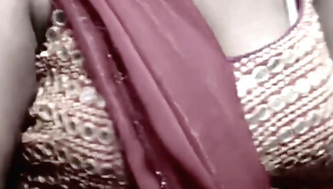 Indian mature auntie opens her bra and shows us her legs