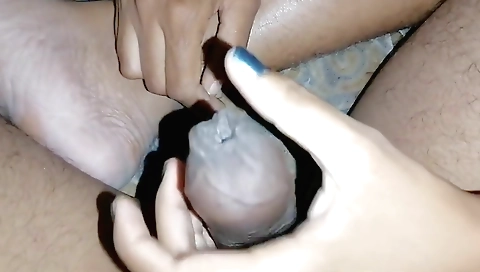 Busty Indian babe in a red dress enjoys a hot handjob