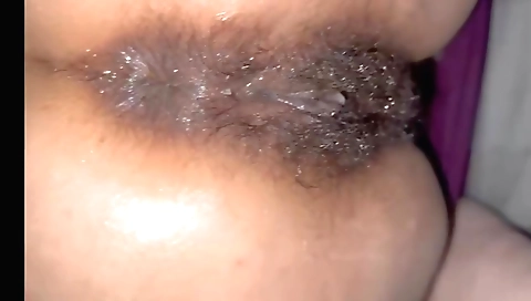 Hairy indian female rubs her hairy bush on the bed